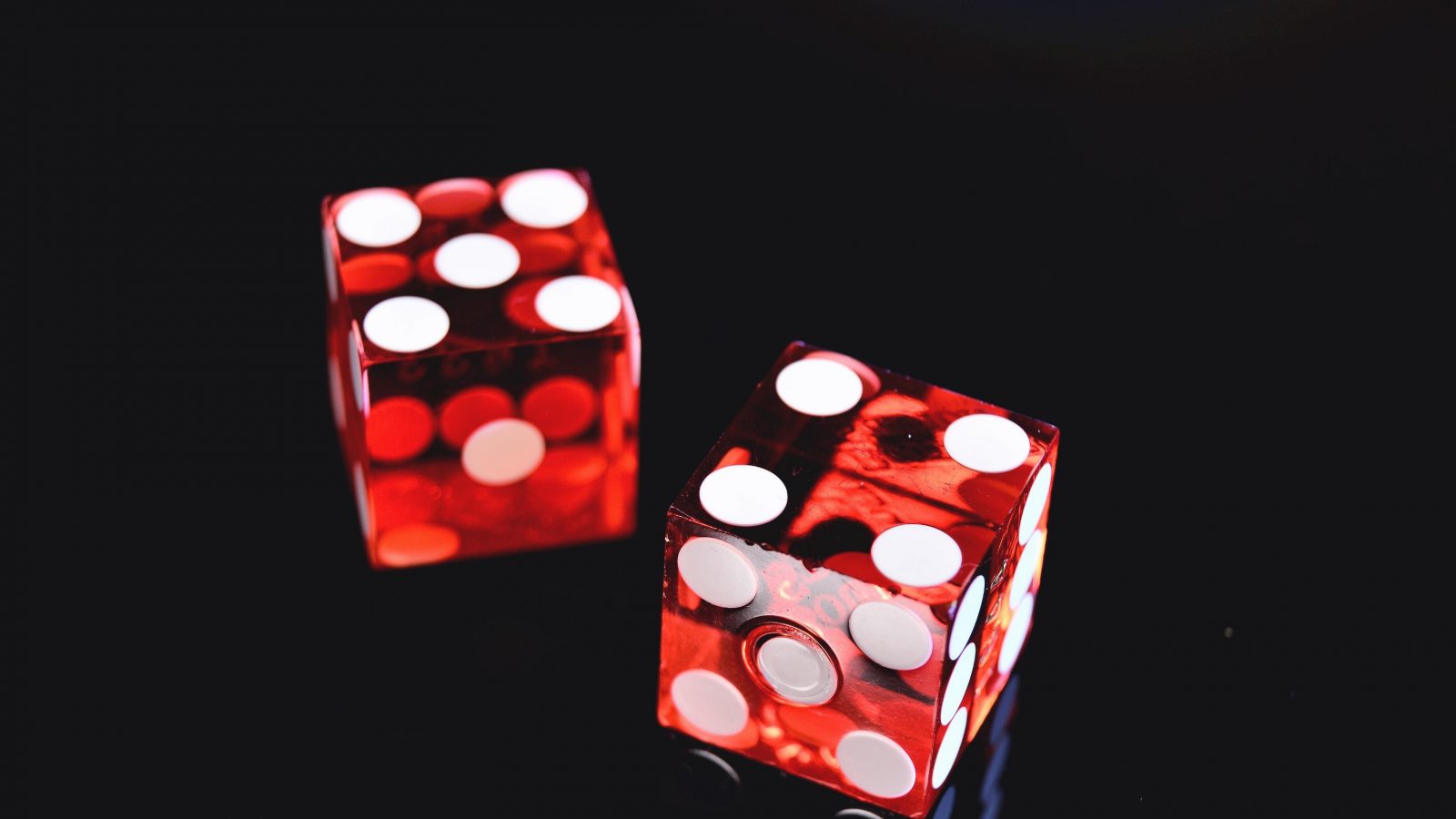 Red dice, representing the gamble of leaving a paying job to bring an action for constructive dismissal