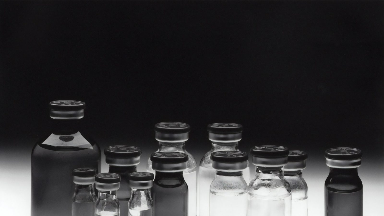 Chemotherapy vials representing an employee with cancer facing discrimination at work