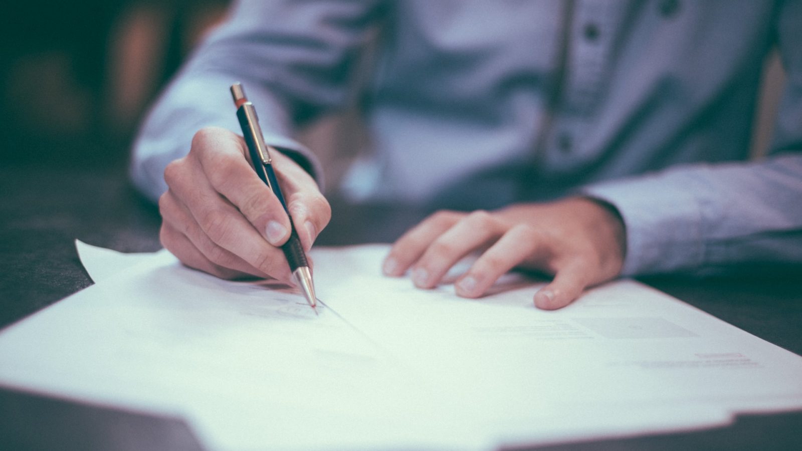 Employee signing contract