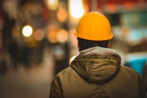 Hardhat on construction worker representing access to long term disability benefits when on leave